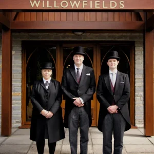Funeral directors standing outside Willowfields